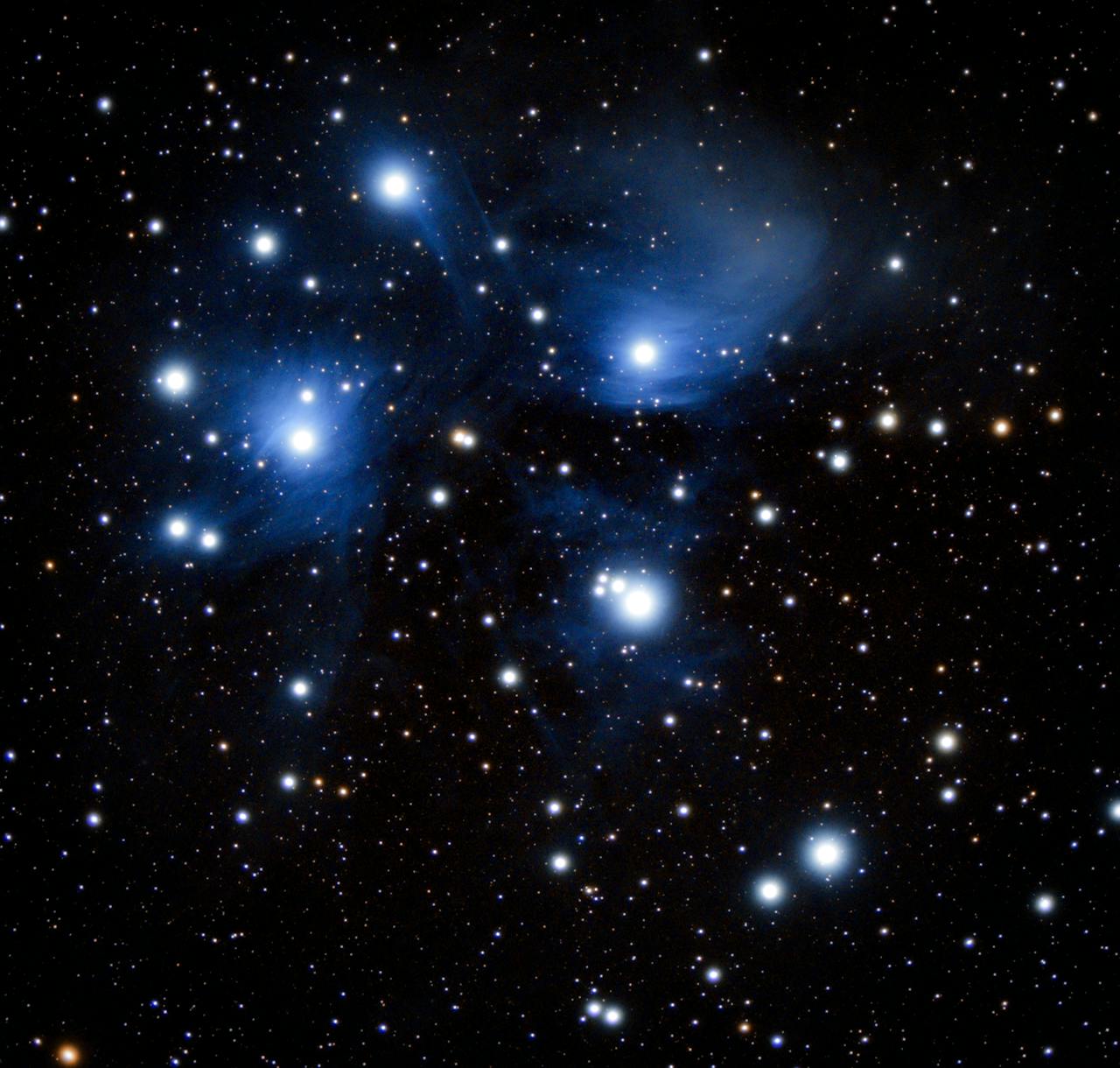 A breathtaking image of the Pleiades star cluster in deep space, glowing brightly.